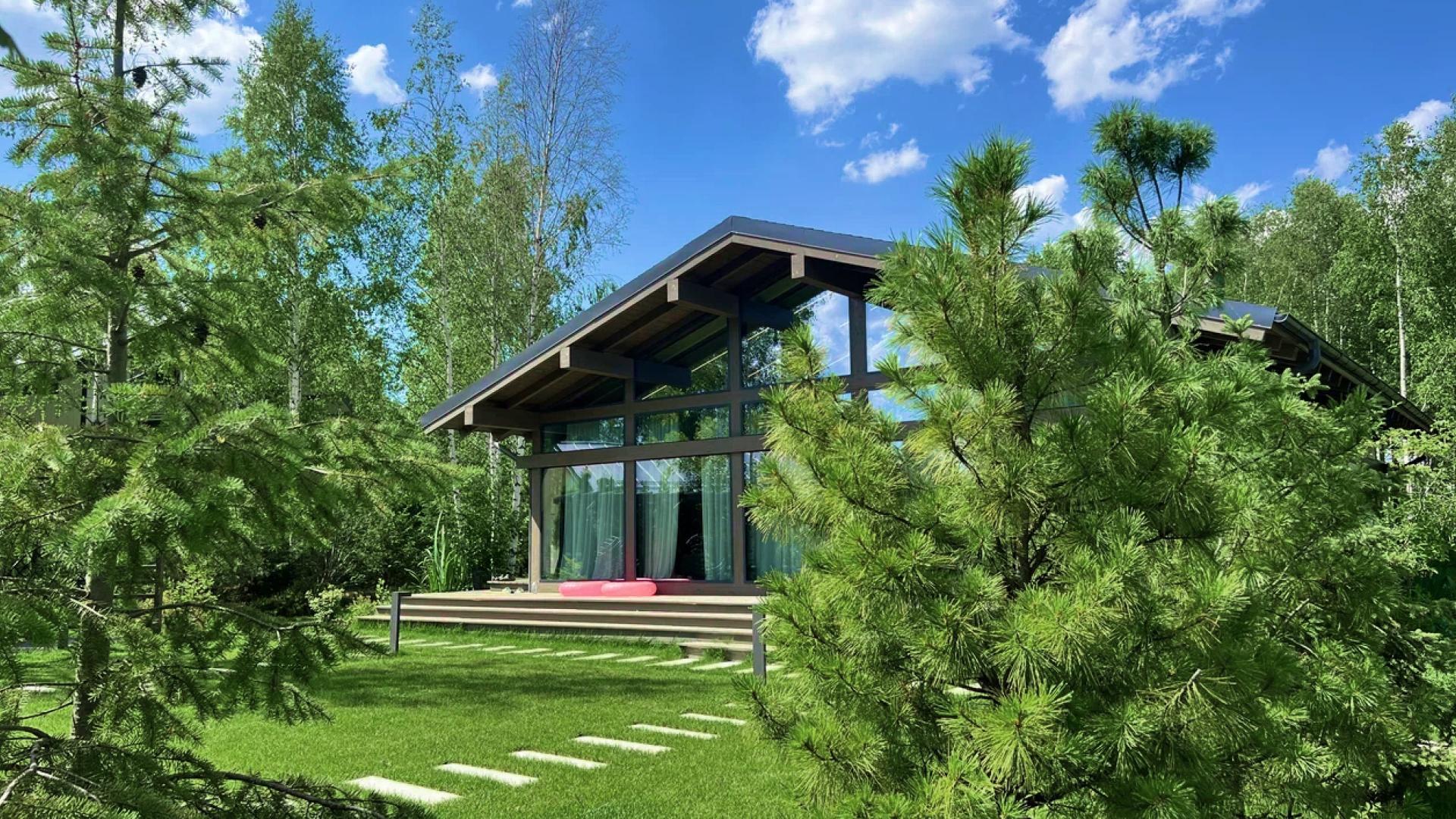 Дом в окружении хвойного леса на территории Bayside Residence